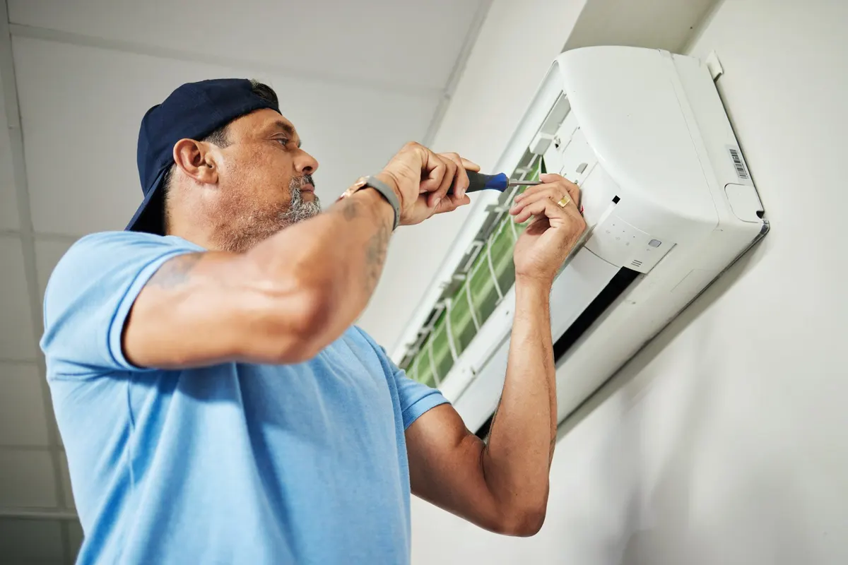 Ductless mini split indoor unit being installed