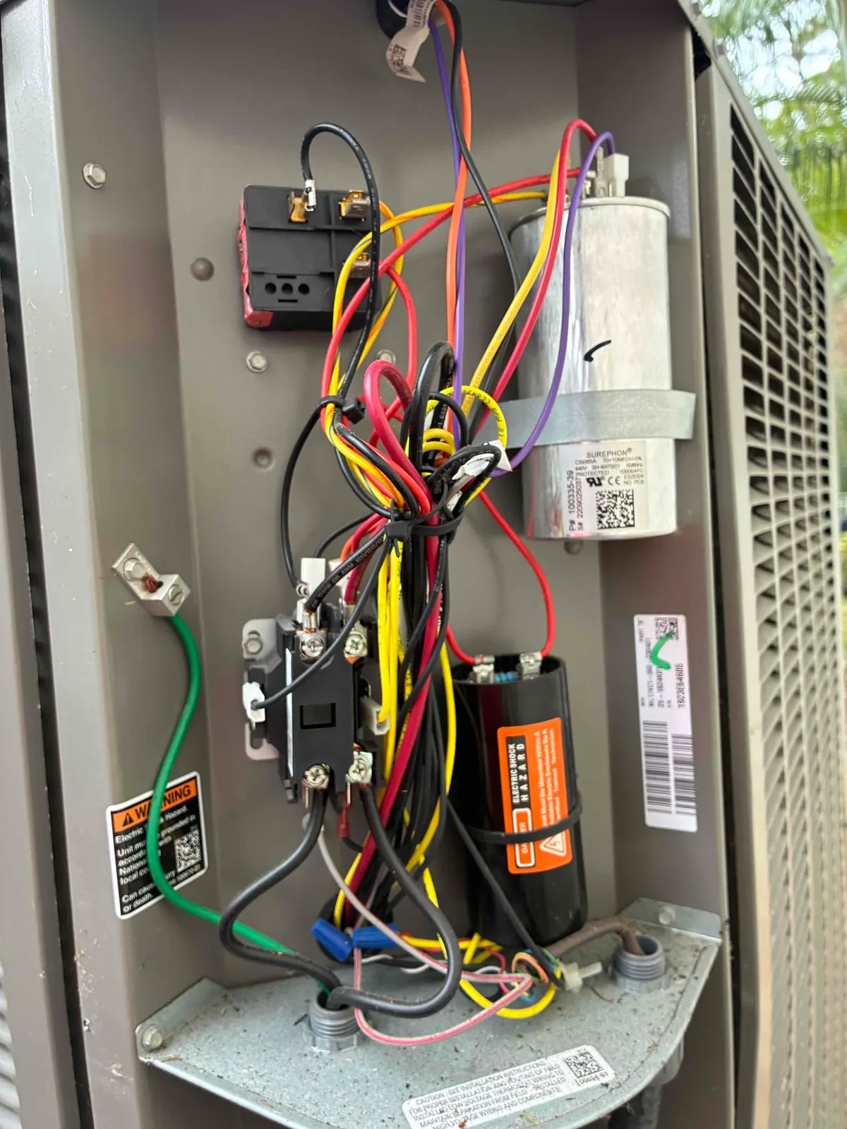 Miranda air conditioning technician working on HVAC equipment