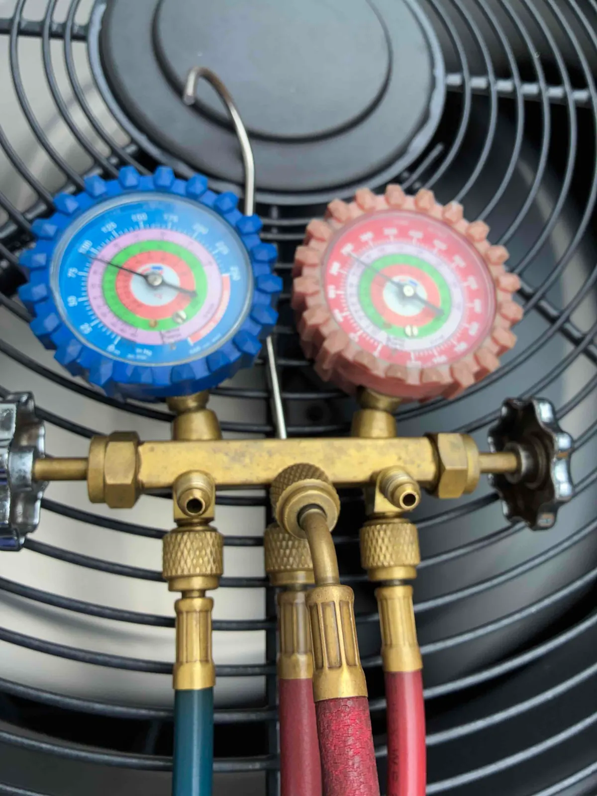 HVAC pressure gauges used during AC tune-up service
