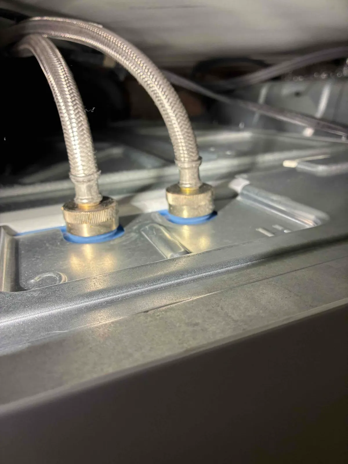 Emergency plumber repairing supply lines
