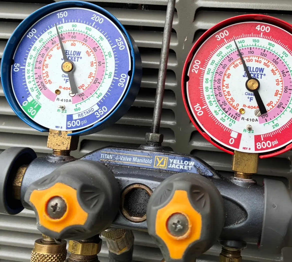 Technician performing emergency HVAC diagnostics