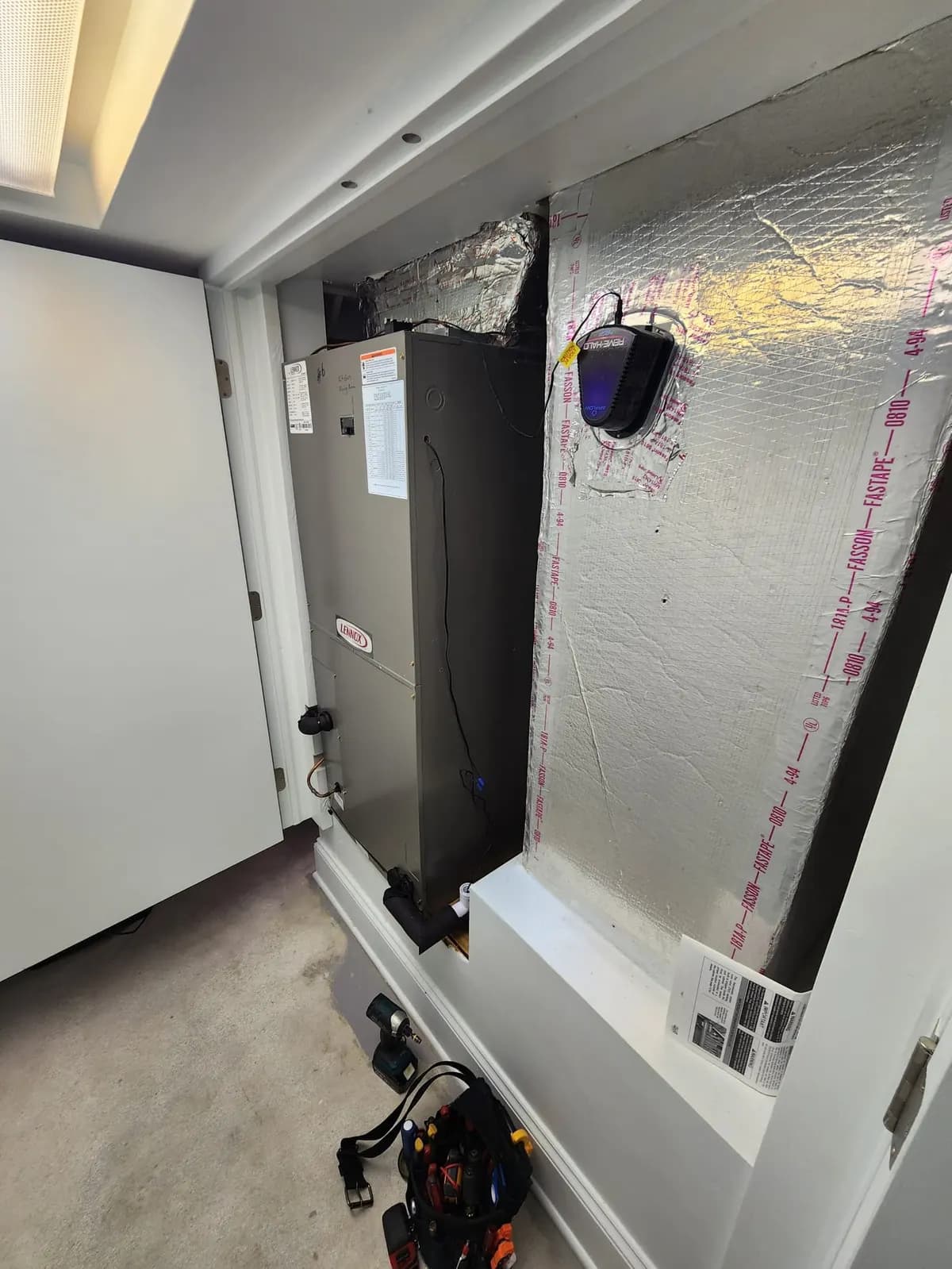 Technician performing furnace tune-up service