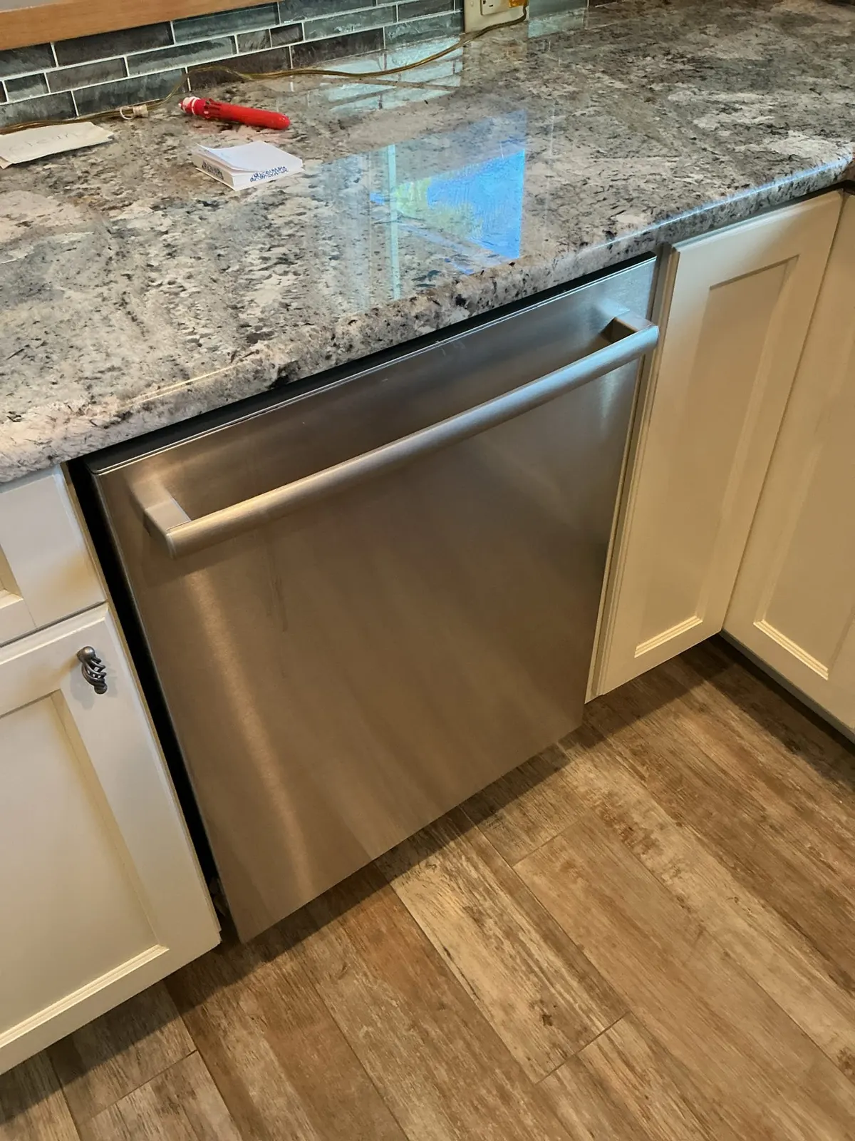Installed stainless steel dishwasher